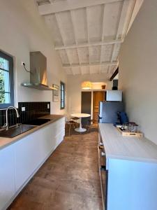 O bucătărie sau chicinetă la Casa 6 -gourdon +4 fotografii