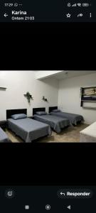 Voodi või voodid majutusasutuse Espaço Ideal 2 toas