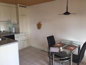 Η κουζίνα ή μικρή κουζίνα στο Haus Am See