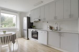 Η κουζίνα ή μικρή κουζίνα στο Quiet apartment, free parking and gym