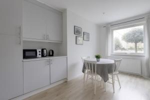 Η κουζίνα ή μικρή κουζίνα στο Quiet apartment, free parking and gym