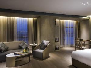 Posezení v ubytování Novotel Shanghai Clover