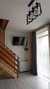 Μια τηλεόραση ή/και κέντρο ψυχαγωγίας στο Mountain flower cottage