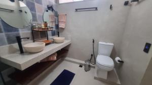 Koupelna v ubytování Quarto vista mar com varanda