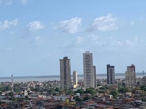 a view of a city with tall buildings at Spacious & Artistic Apartment in Belém in Belém