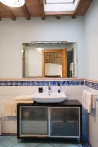 Koupelna v ubytování Le Dimore by Borgo Tessile - Voltumna + 38 fotografií