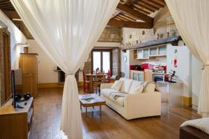 Posezení v ubytování Le Dimore by Borgo Tessile - Voltumna