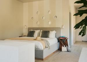 Una cama o camas en una habitación de Hotel Circulo