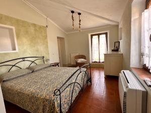 Postel nebo postele na pokoji v ubytování Il Casale di Zoe + 36 fotografií