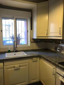 Kuchyň nebo kuchyňský kout v ubytování Duque De Rivas 42