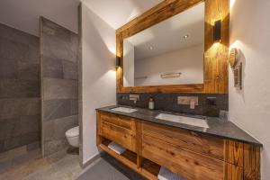 Koupelna v ubytování Chalet Cimes and Dreams - Petit coin de paradis + 32 fotografií