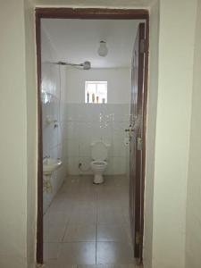 Phòng tắm tại Prime Stay by Xalleria ,Cozy Studio, Lower Kabete