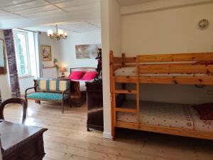 Postel nebo postele na pokoji v ubytování A la Grenouille du Jura