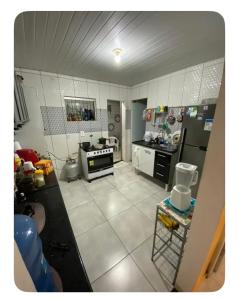 Kuchyň nebo kuchyňský kout v ubytování Casa familiar