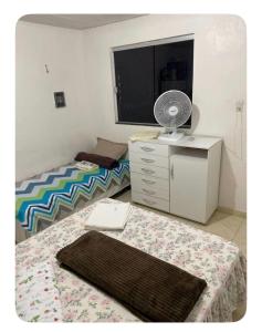 Postel nebo postele na pokoji v ubytování Casa familiar