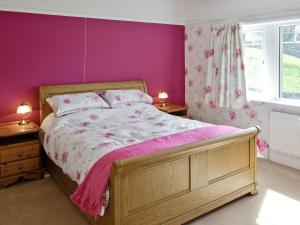 Postel nebo postele na pokoji v ubytování Greystones + 5 fotografií