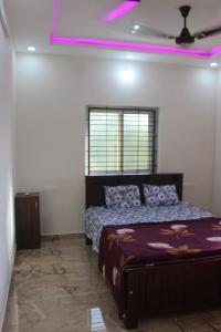 Ένα ή περισσότερα κρεβάτια σε δωμάτιο στο Cozy Villa