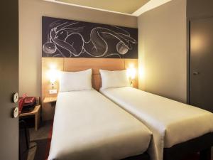 Postel nebo postele na pokoji v ubytování ibis Yerevan Center + 78 fotografií