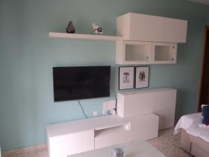 Una televisión o centro de entretenimiento en Apartamento Centro Jerez Campillo I