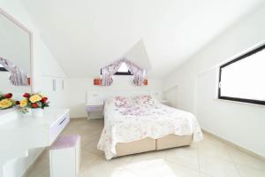 a white bedroom with a bed and a window at Villa Garden Island in Dalyan +43 photos