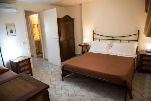 Postel nebo postele na pokoji v ubytování Bilocale Alborense