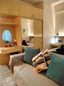 Posezení v ubytování Lauriz Place 2 at Amani Grand Resort and Residences