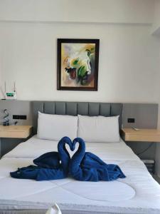 Postel nebo postele na pokoji v ubytování Lauriz Place 2 at Amani Grand Resort and Residences