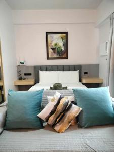 Postel nebo postele na pokoji v ubytování Lauriz Place 2 at Amani Grand Resort and Residences