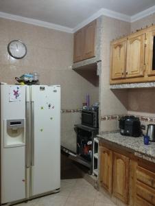 Η κουζίνα ή μικρή κουζίνα στο Super appartement quartier paisible proches toutes commodités +25 φωτογραφίες