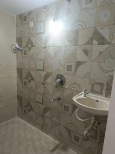 Koupelna v ubytování Bhavya Homstayes