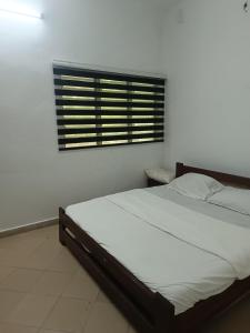 Postel nebo postele na pokoji v ubytování Villa King Ohm ara y