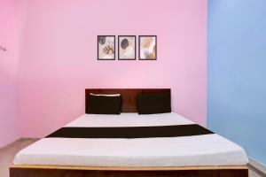 Postel nebo postele na pokoji v ubytování Hotel O BLUE DIAMOND HOTEL