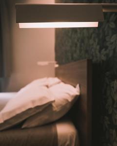 Postel nebo postele na pokoji v ubytování Via Sapri Luxury Rooms and Apartments + 2 fotografie