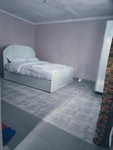 Postel nebo postele na pokoji v ubytování Tunda Paradise Motel & Gardens