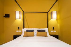 Postel nebo postele na pokoji v ubytování Maison Luxury Plaza