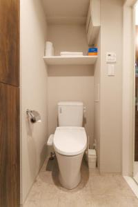 a bathroom with a toilet in a small room at LANG HOTEL Kameido - Vacation STAY 76905v in Tokyo +14 photos