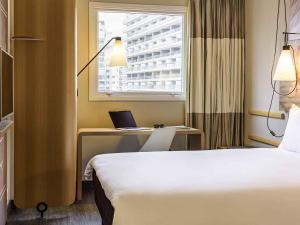 Postel nebo postele na pokoji v ubytování ibis Sao Paulo Ibirapuera + 93 fotografií