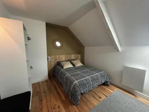 Postel nebo postele na pokoji v ubytování Le Ker Maclow