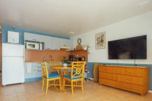 Kuchyň nebo kuchyňský kout v ubytování Paradise Perch - Royal Retreats at Maho Beach