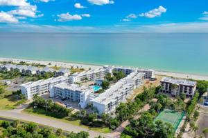 an aerial view of a resort with the beach at Island Beach Club #340E in Sanibel