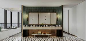 a living room with a fireplace and a table at Mehood Elegant Hotel Panyu Chimelong Wanbo in Guangzhou +84 photos