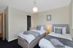 Ένα ή περισσότερα κρεβάτια σε δωμάτιο στο Free Parking - Central - 2 Bedroom - 4 Guests