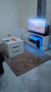 TV a/nebo společenská místnost v ubytování Ssambu Homes + 3 fotografie