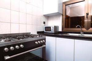 Kuchyň nebo kuchyňský kout v ubytování Appartement Nika + 4 fotografie