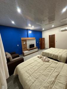 Postel nebo postele na pokoji v ubytování Hospedaje Diamante