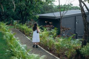 Zahrada ubytování The Chalets, Mulshi