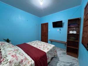 Postel nebo postele na pokoji v ubytování Refúgio Marajoara