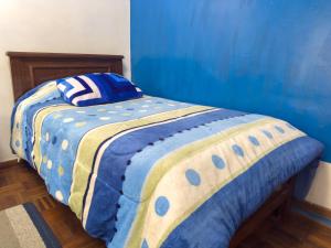 Ένα ή περισσότερα κρεβάτια σε δωμάτιο στο Casa Casso