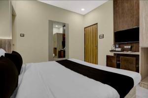 TV a/nebo společenská místnost v ubytování Townhouse Oak Kaal Bhairav Temple + 26 fotografií