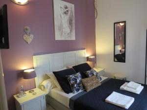 Postel nebo postele na pokoji v ubytování Le Castel Home Nîmes